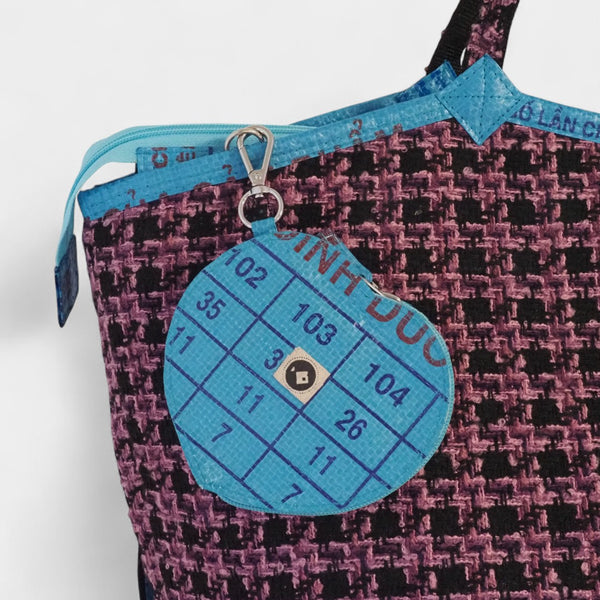 Herz-Börse in blau-aqua - passend zur lila-schwarzen TWEED Soulmate, die innen mit blauem Fischfuttersack gefüttert ist